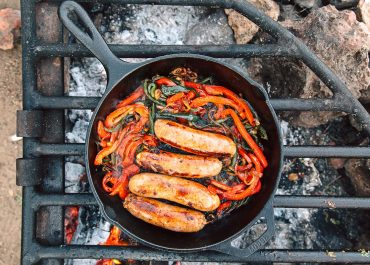 Cast Iron Brats with Peppers and Onions